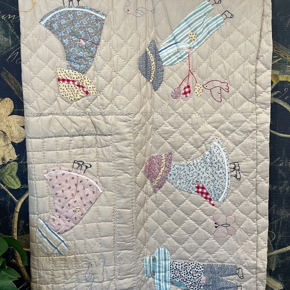 Appliqued and embroidered quilt